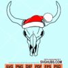 Cow head skull with christmas hat svg