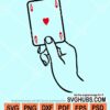 Hand holding playing card svg